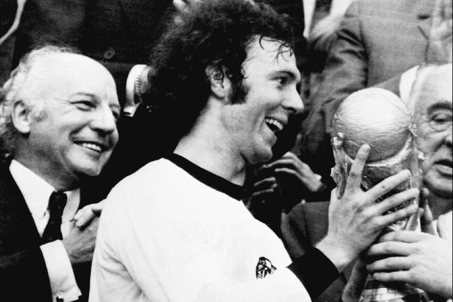 Beckenbauer with the World Cup trophy