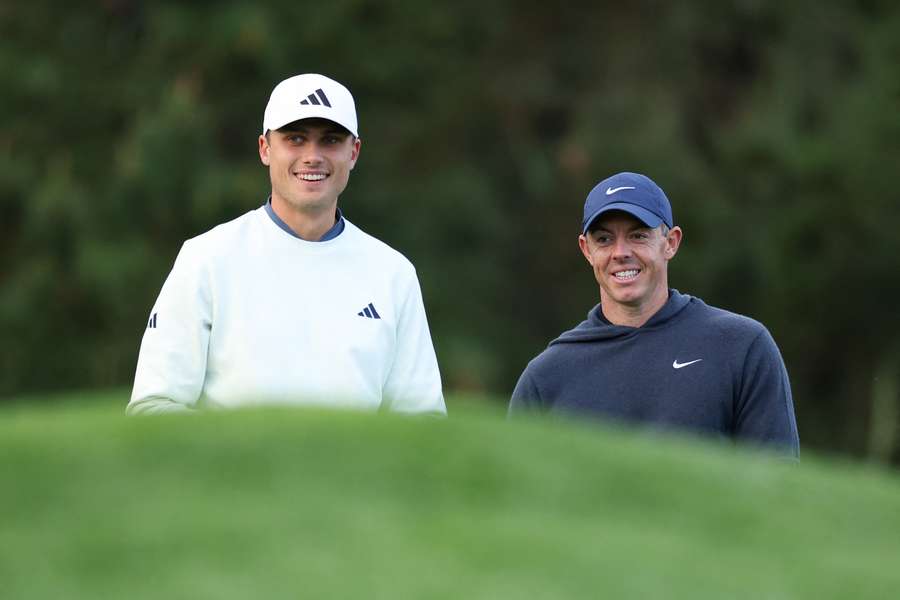 McIlroy (r) is still searching for his first Masters victory