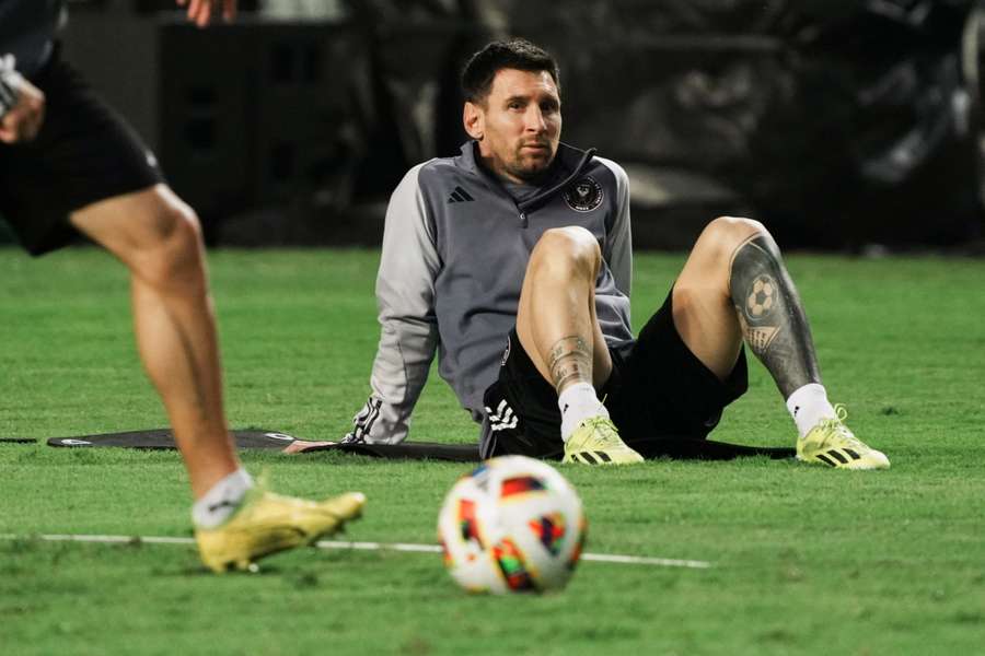 Lionel Messi looks on during training in Hong Kong
