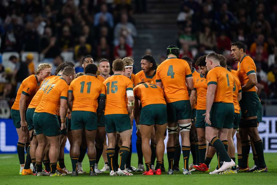The Wallabies huddle during their loss to Wales