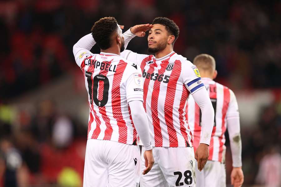 Josh Laurent of celebrates with Tyrese Campbell of Stoke City