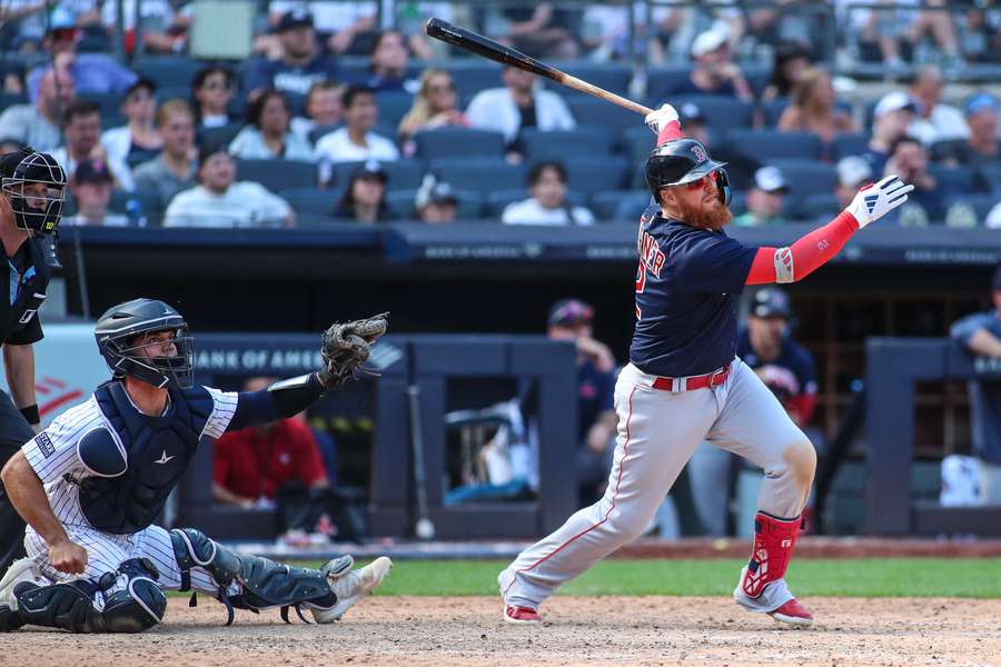 Turner hits an RBI double in the ninth inning against the New York Yankees