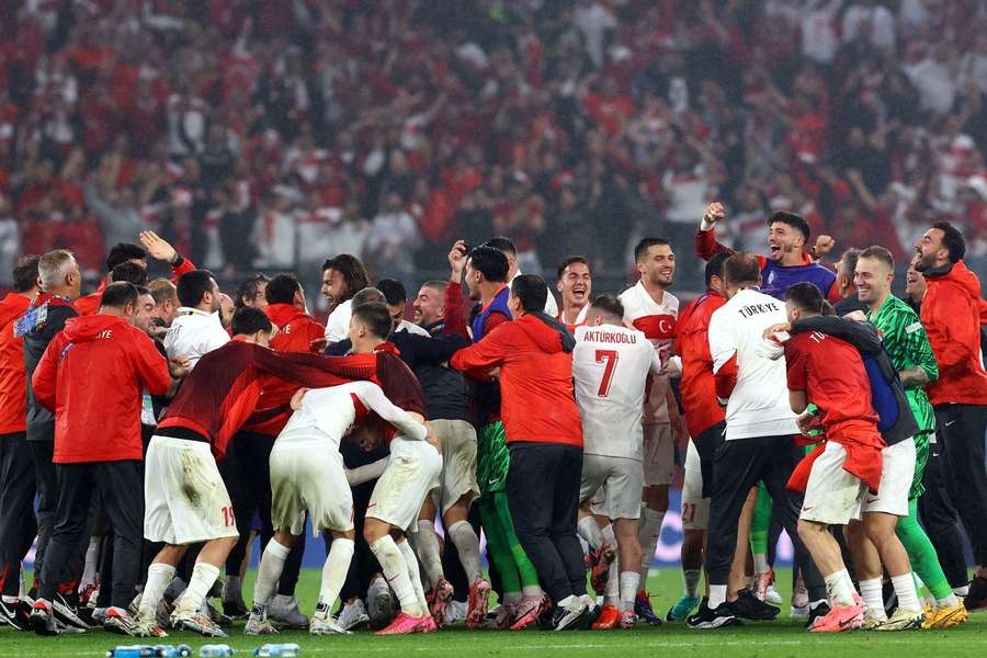 Turkey's players and staff celebrate the win on Tuesday
