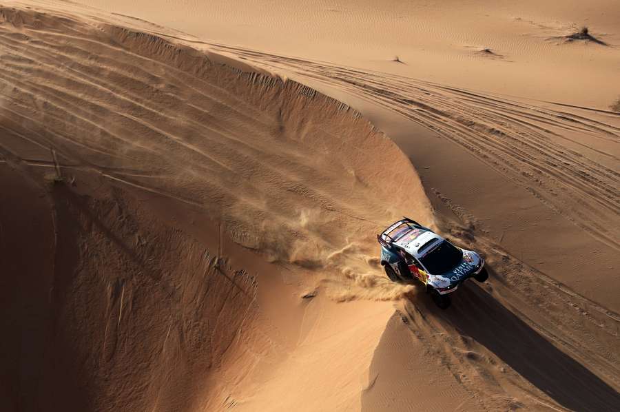 Nasser Al-Attiyah and co-driver Mathieu Baumel in action during stage five