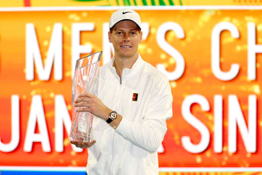 Jannik Sinner poses with Butch Buchholz Trophy after winning 2026 Miami Open