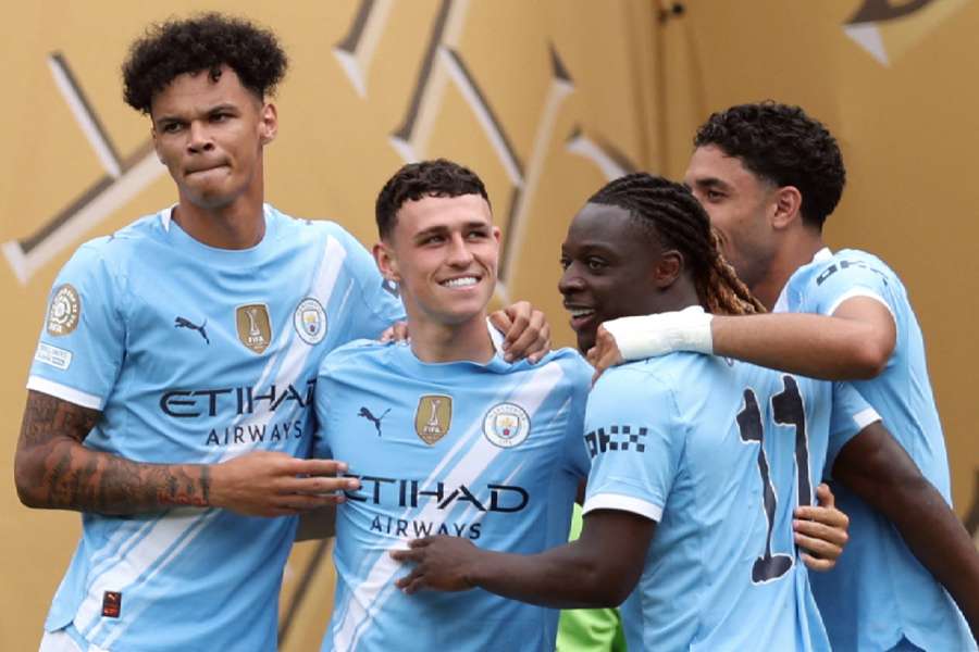 Phil Foden is congratulated after scoring the opening goal for Man City against Wydad