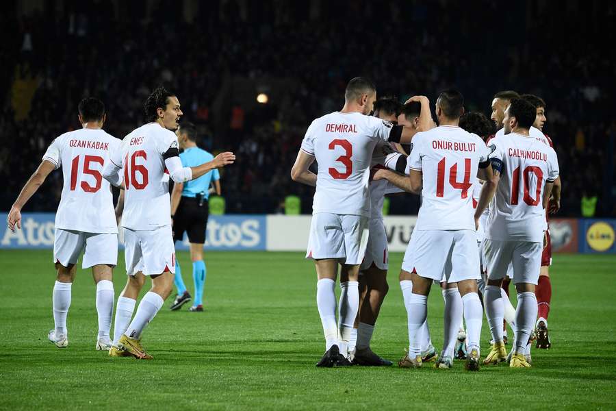 Turkey scored either side of half-time to beat Armenia
