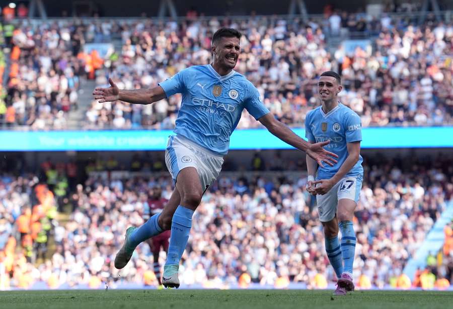 Rodri celebrates scoring his side's third against West Ham