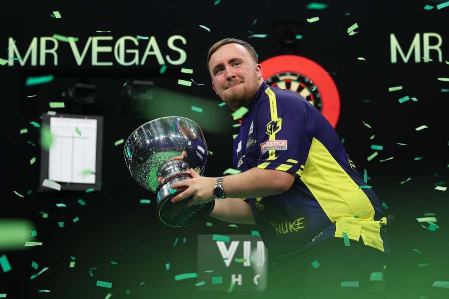 Luke Littler with the 2024 Grand Slam of Darts trophy Luke Littler with the 2024 Grand Slam of Darts trophy