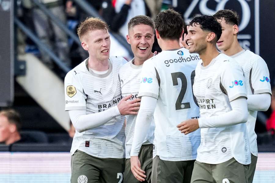 PSV celebrate Joey Veerman's 3-1 against NEC