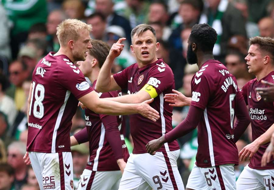 Lawrence Shankland celebrates his opener for Hearts Lawrence Shankland celebrates his opener for Hearts