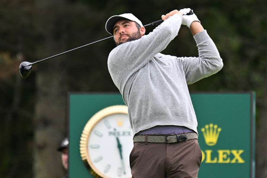 Scottie Scheffler watches his drive from the 5th tee on the opening day of the 153rd Open Championship at Royal Portrush 