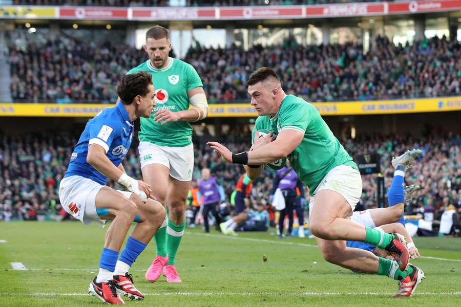 Ireland's hooker Dan Sheehan prepares to scores the team's second try