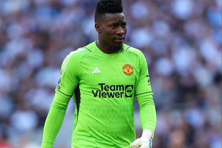 Amad Diallo celebrates scoring Man Utd's second goal against Liverpool at Anfield