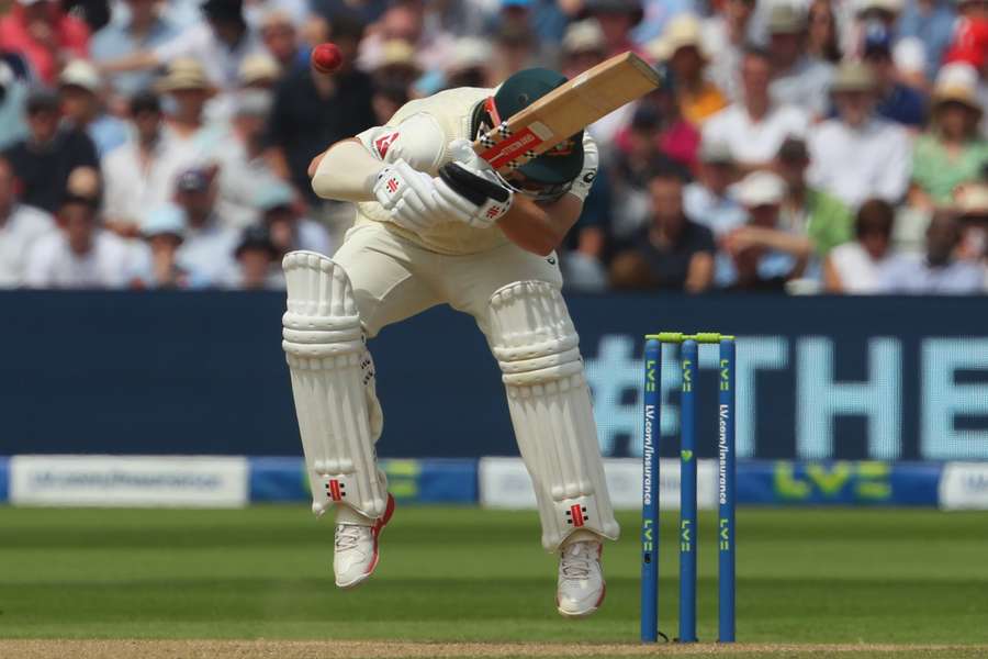 Australia's Travis Head ducks under a short ball from England's Stuart Broad during play on day two