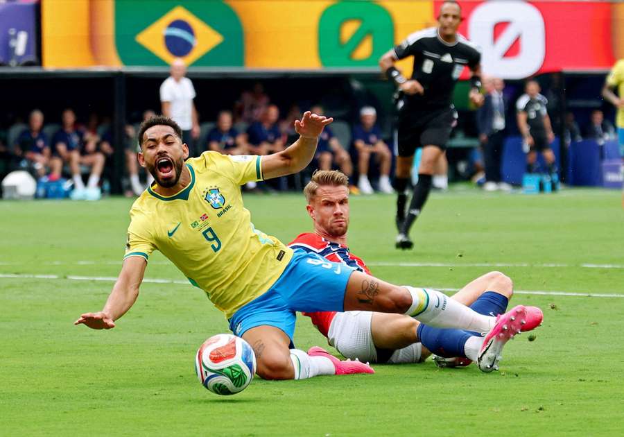 Norway's Kristoffer Ajer fouls Brazil's Matheus Cunha to concede a penalty Norway's Kristoffer Ajer fouls Brazil's Matheus Cunha to concede a penalty