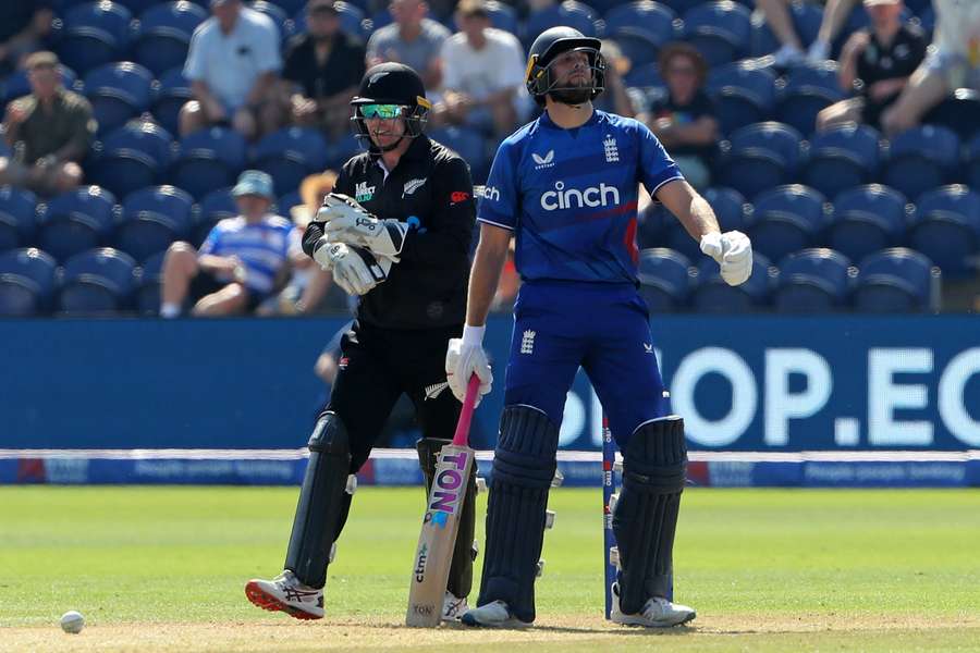 England's Dawid Malan reacts after being bowled by New Zealand's Rachin Ravindra