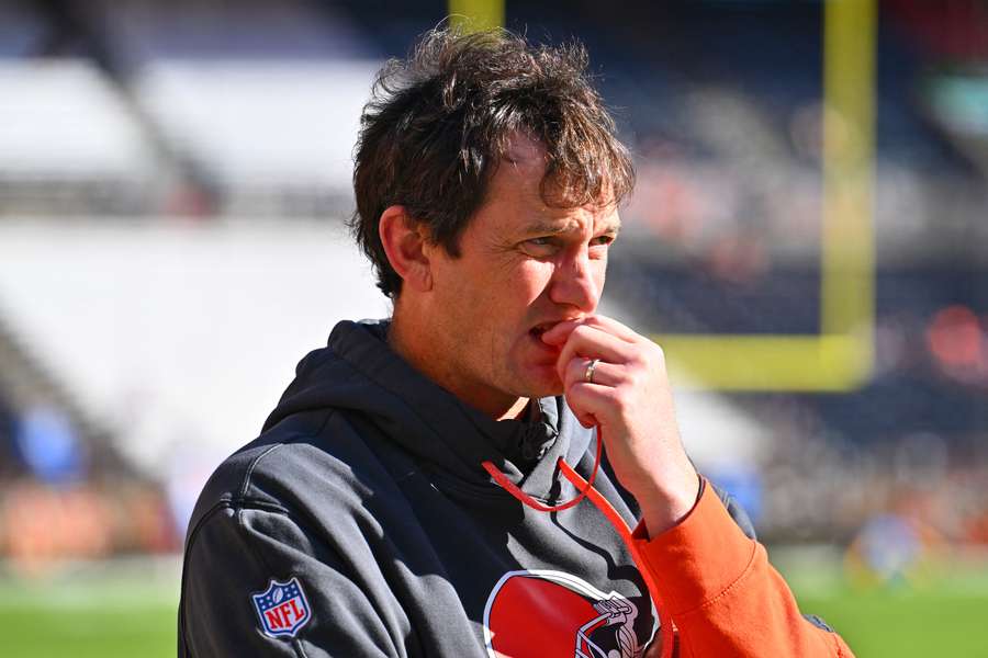 Cleveland Browns offensive coordinator Ken Dorsey looks at the field before a game 
