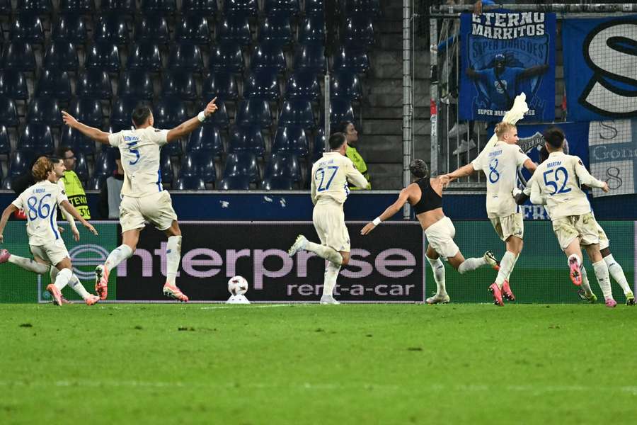FC Porto players celebrate scoring the winner