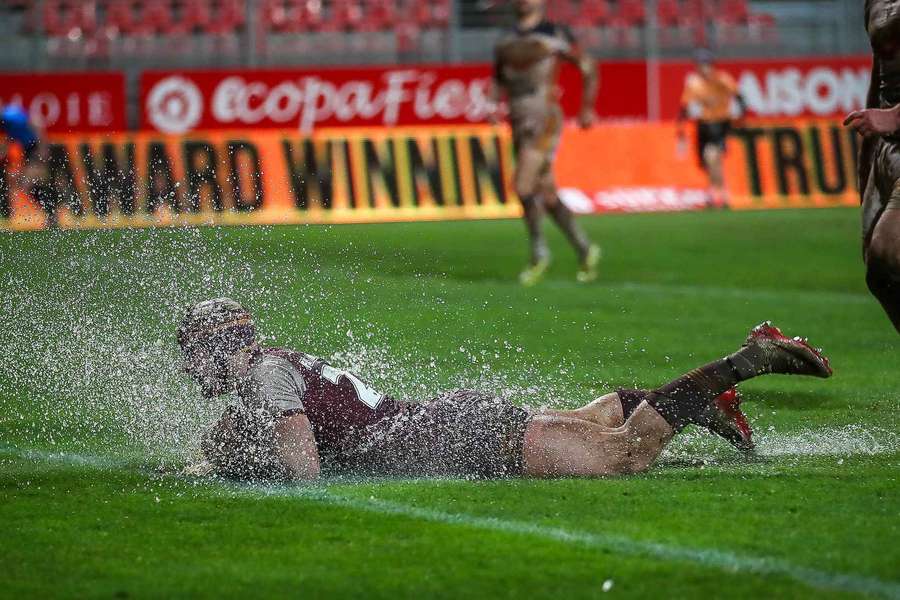 Um jogador de râguebi em ação