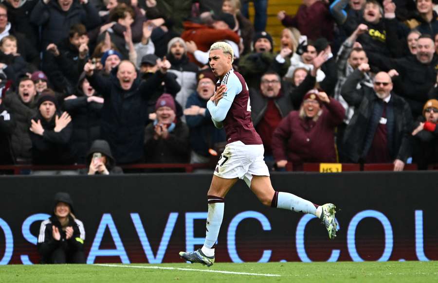 Rogers celebrates after scoring