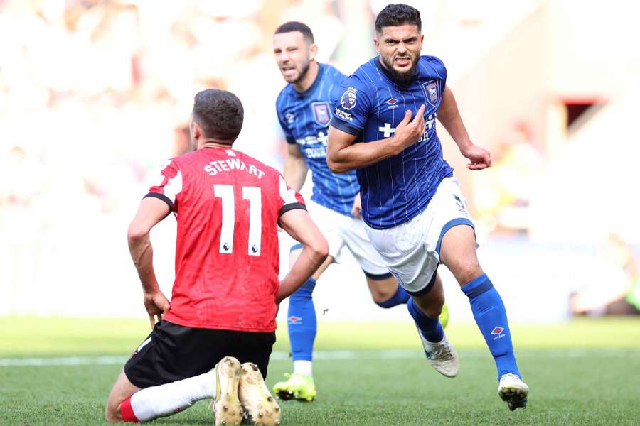 Sam Morsy celebrates scoring the equalising goal for Ipswich