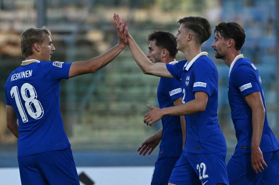 Adrian Svanback (22) celebrates a debut goal for Finland Adrian Svanback (22) celebrates a debut goal for Finland