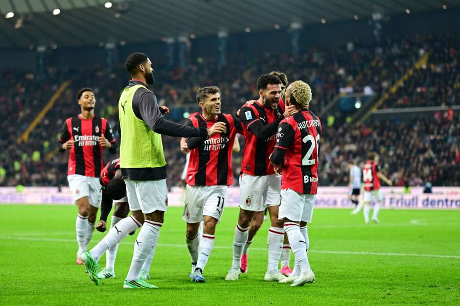 AC Milan's Omari Hutchinson celebrates scoring their second goal with teammates AC Milan's Omari Hutchinson celebrates scoring their second goal with teammates