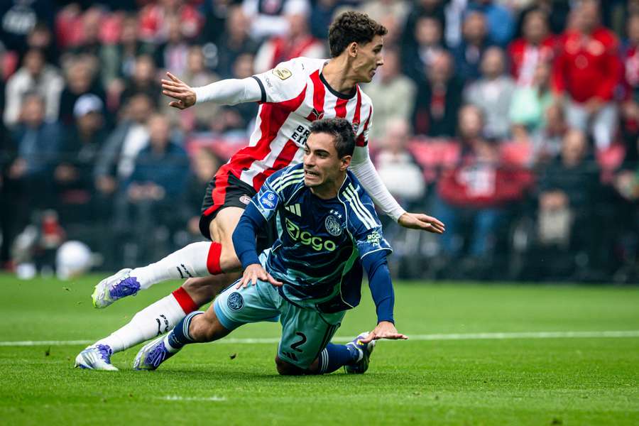 PSV's Ruben van Bommel battling Ajax's Lucas Rosa