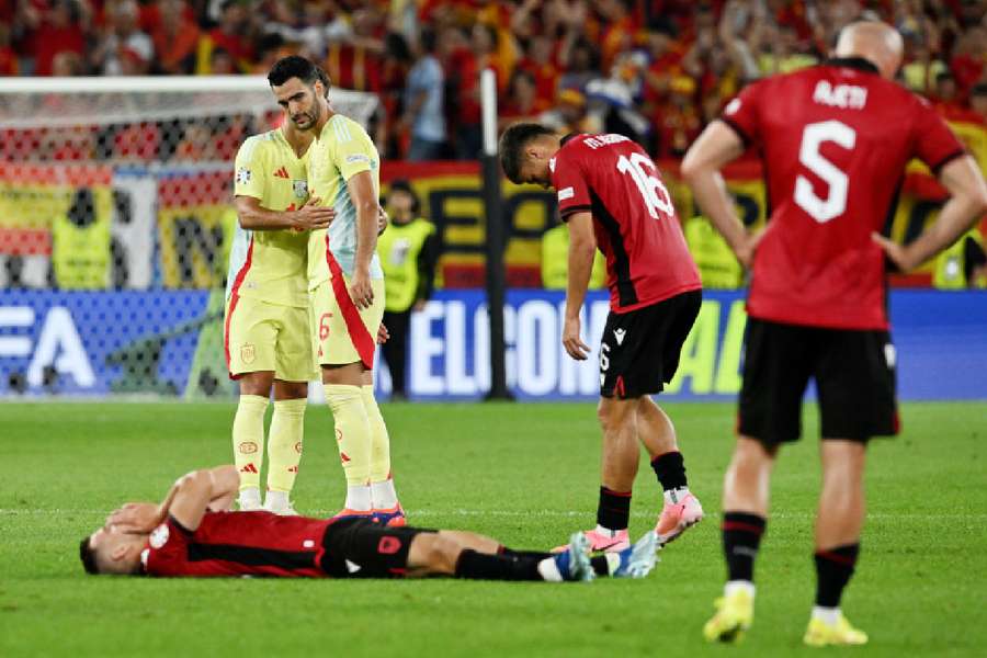 Albania players look distraught after group stage exit