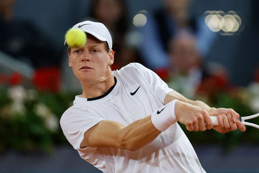 Italy's Jannik Sinner returns the ball to Russia's Pavel Kotov during the third round of the 2024 ATP Tour Madrid Open