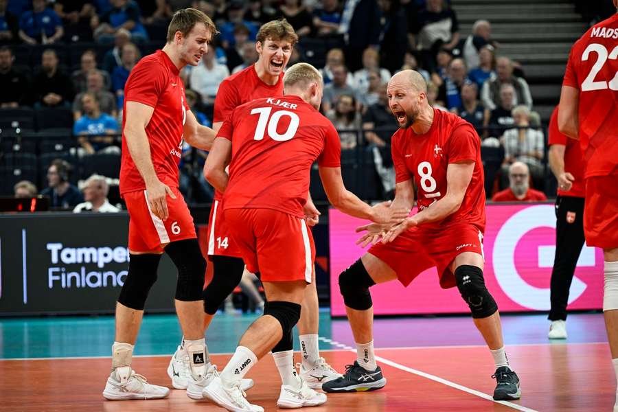 Denmark celebrates winning a point against Estonia Denmark celebrates winning a point against Estonia