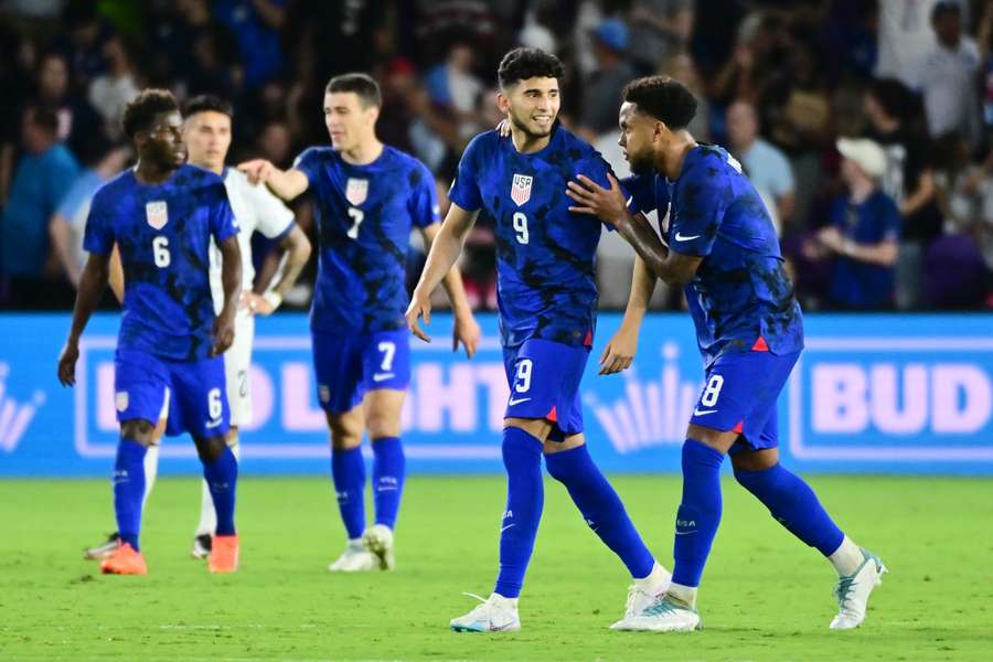 Pepi celebrates alongside Weston McKennie (R)