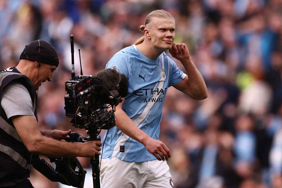 Rooney says Man City's "over the top" celebrations "might come back to bite them" Rooney says Man City's "over the top" celebrations "might come back to bite them"