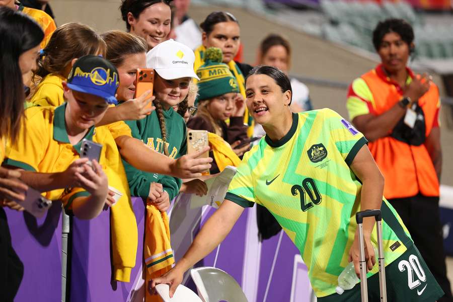 Sam Kerr poses for photographs with supporters in Perth. Sam Kerr poses for photographs with supporters in Perth.