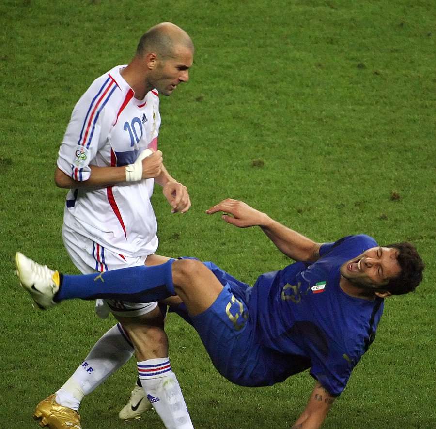 Italy's Marco Materazzi falls to the ground after France's Zinedine Zidane (L) headbutted him in the 2006 World Cup final Italy's Marco Materazzi falls to the ground after France's Zinedine Zidane (L) headbutted him in the 2006 World Cup final