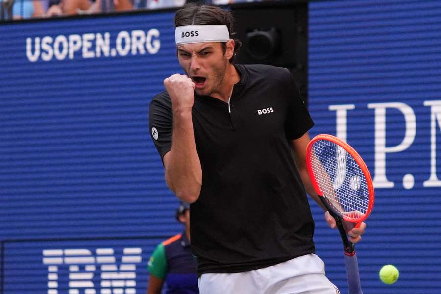 Taylor Fritz celebrates after defeating Alexander Zverev