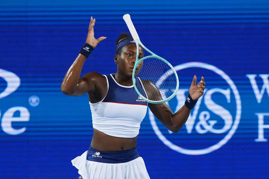 Coco Gauff tosses her racquet after losing a point during her match against Jasmine Paolini