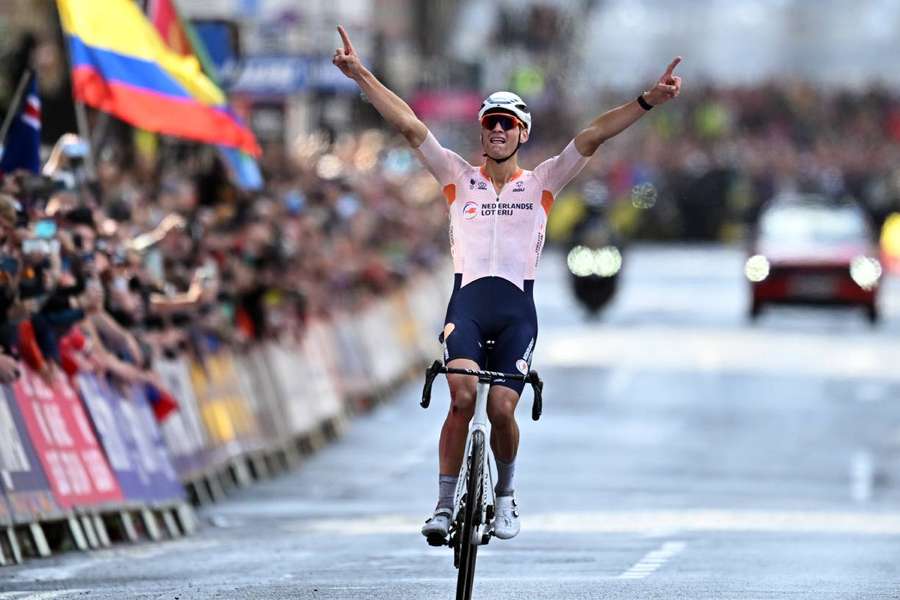 Mathieu van der Poel reacts after winning the men's road race at the Cycling World Championships in Edinburgh