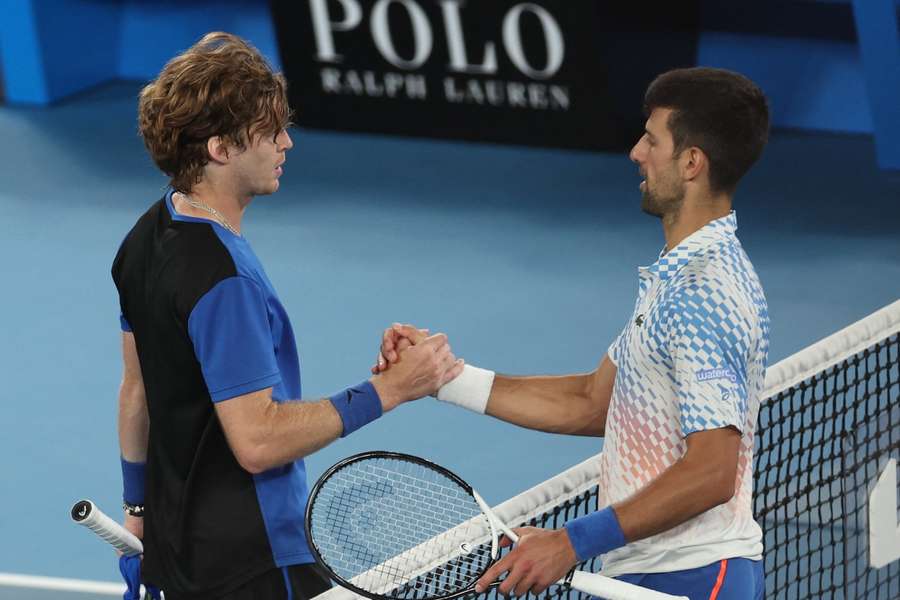 Rublev shakes hands with Djokovic after the match