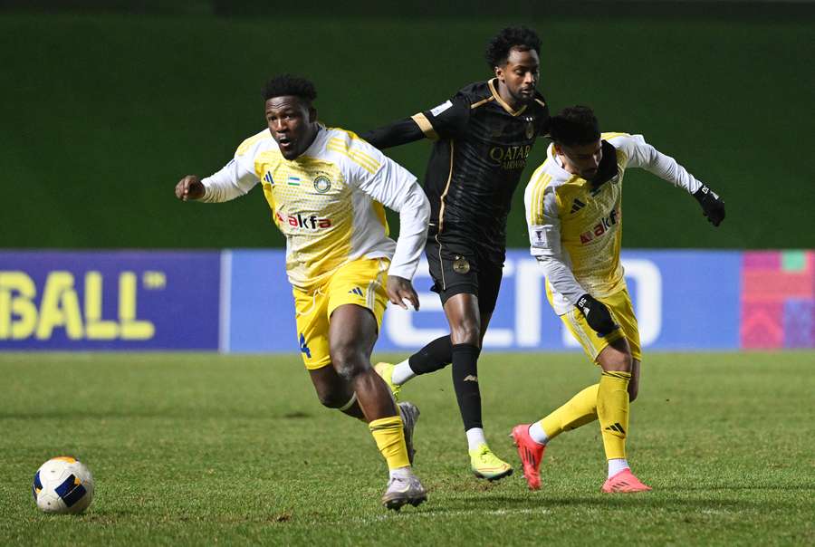 Brayan Riascos, left, scored twice to send his side through