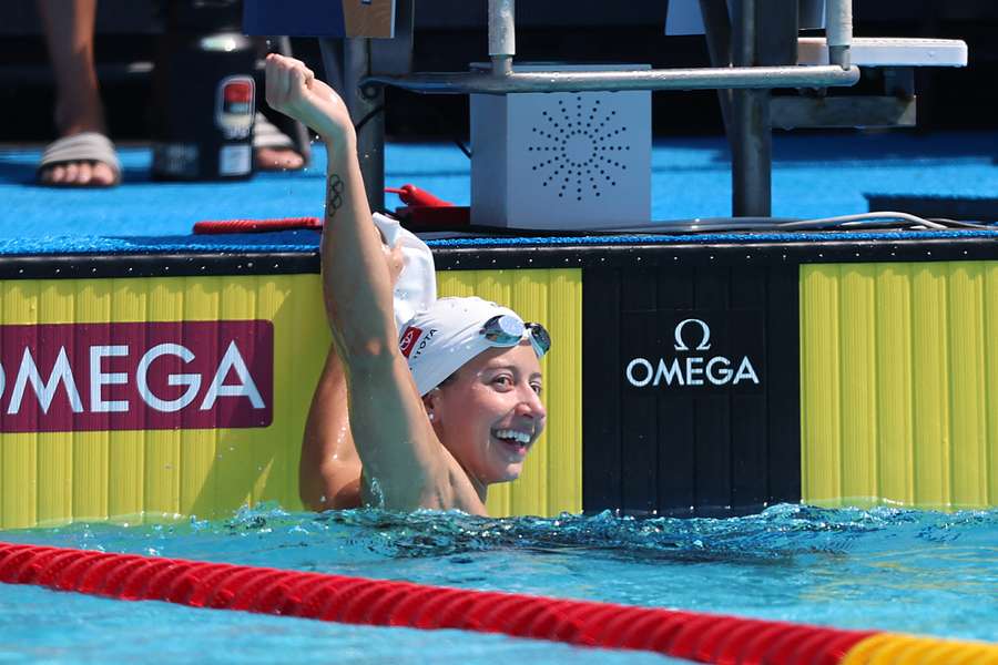 Kate Douglass reacts after setting the world record Kate Douglass reacts after setting the world record