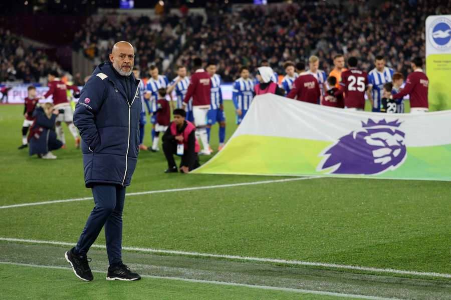 Nuno Espirito Santo walks onto the pitch at London Stadium before West Ham's Premier League match on Tuesday.