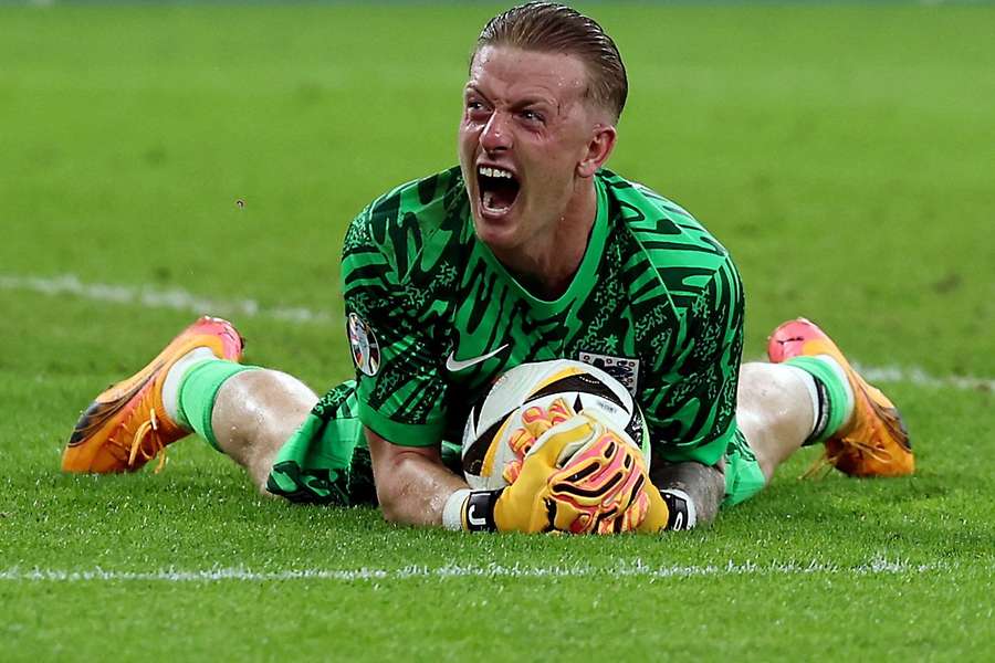 Jordan Pickford reacts wildly as England beat Slovakia