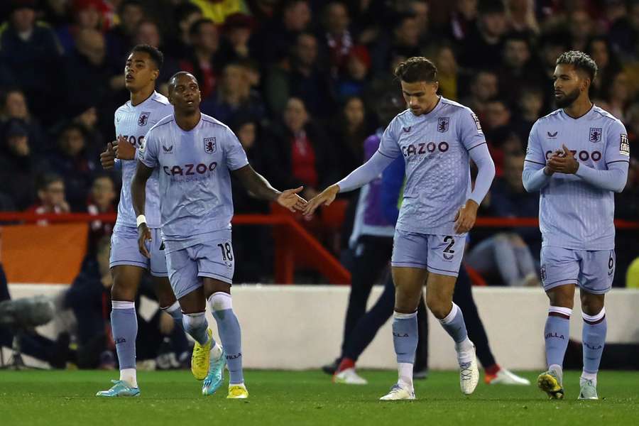 Ashley Young celebrates with team-mates 