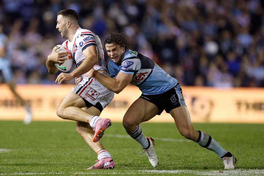 James Tedesco takes on Nicho Hynes during the Sydney Roosters' elimination final loss to Cronulla.