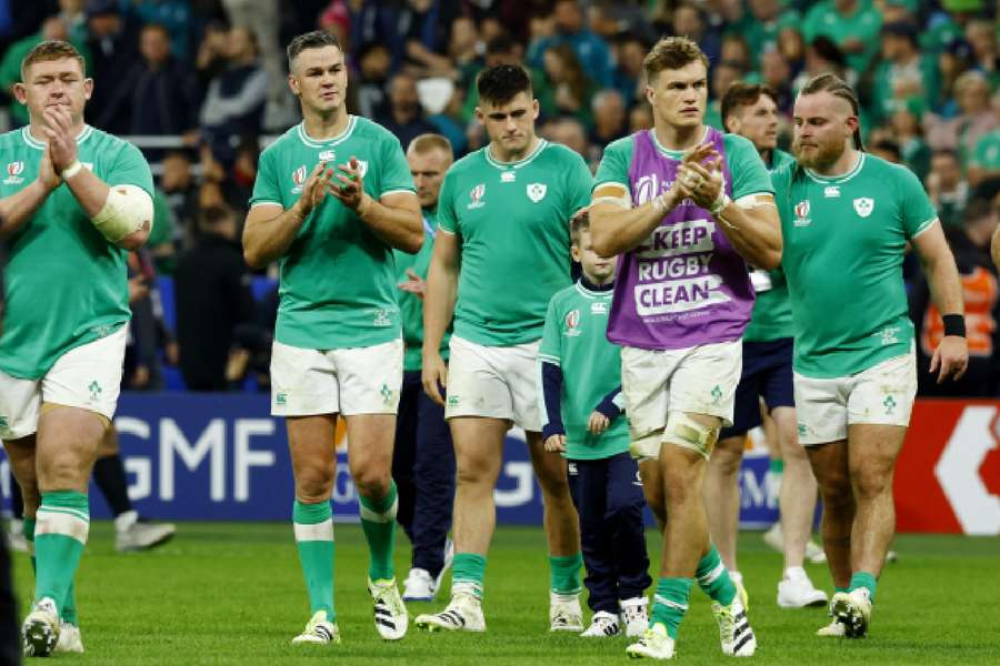Ireland players applaud the fans after the match