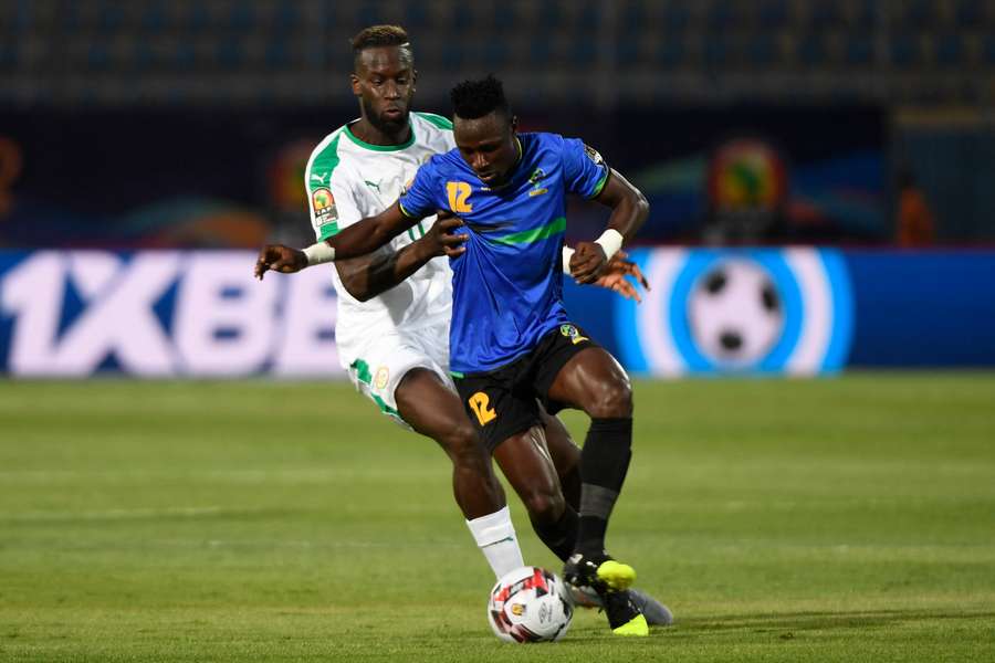 Tanzania's Simon Msuva, right, playing Senegal during the 2019 AFCON