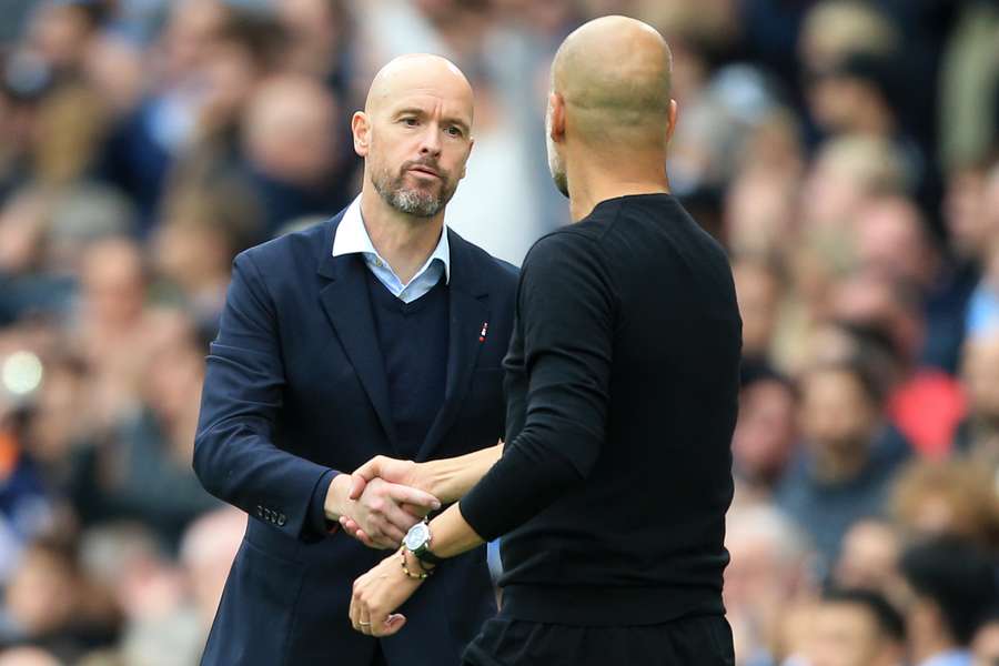 Pep Guardiola and Erik ten Hag shake hands after the match between Manchester City and Manchester United 