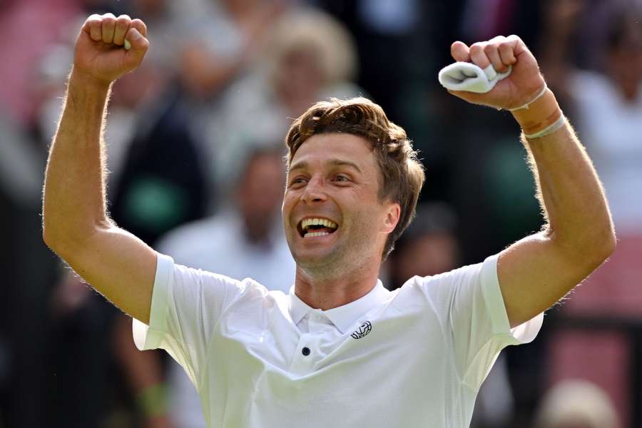 Britain's Liam Broady celebrates beating Norway's Casper Ruud after winning their men's singles tennis match